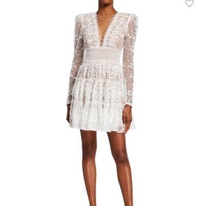 Bronx And Banco
Megan V-Neck Illusion Tiered Lace Dress